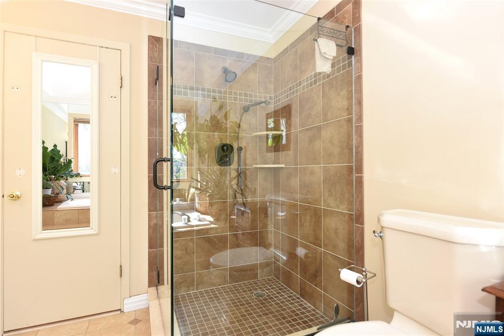 41 Litchult Lane Mahwah, NJ 07430 - Photo 27 of 50 a bathroom with a shower