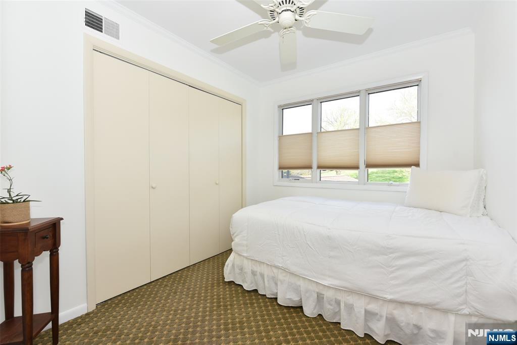41 Litchult Lane Mahwah, NJ 07430 - Photo 29 of 50 a bedroom with a bed and a window