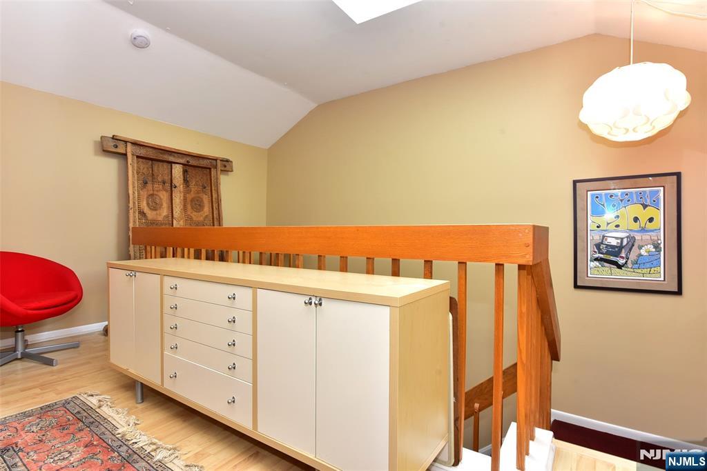 41 Litchult Lane Mahwah, NJ 07430 - Photo 32 of 50 a bedroom with a bed and a dresser