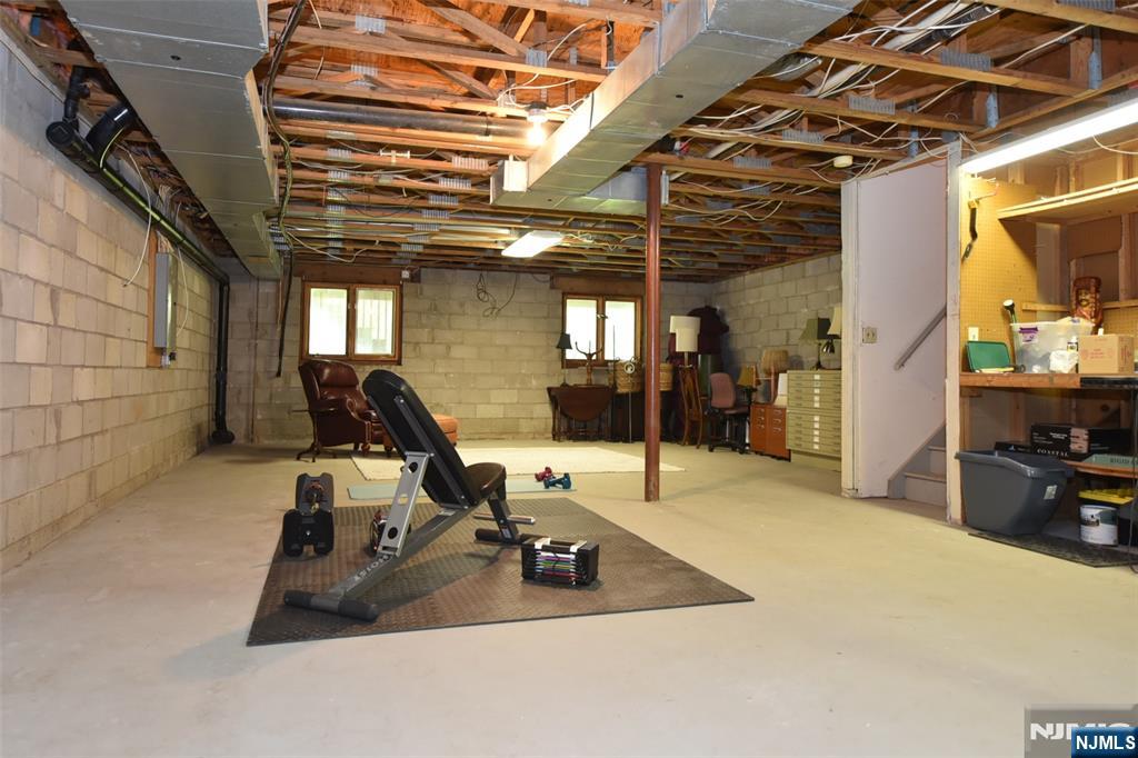 41 Litchult Lane Mahwah, NJ 07430 - Photo 36 of 50 a view of a room with gym equipment