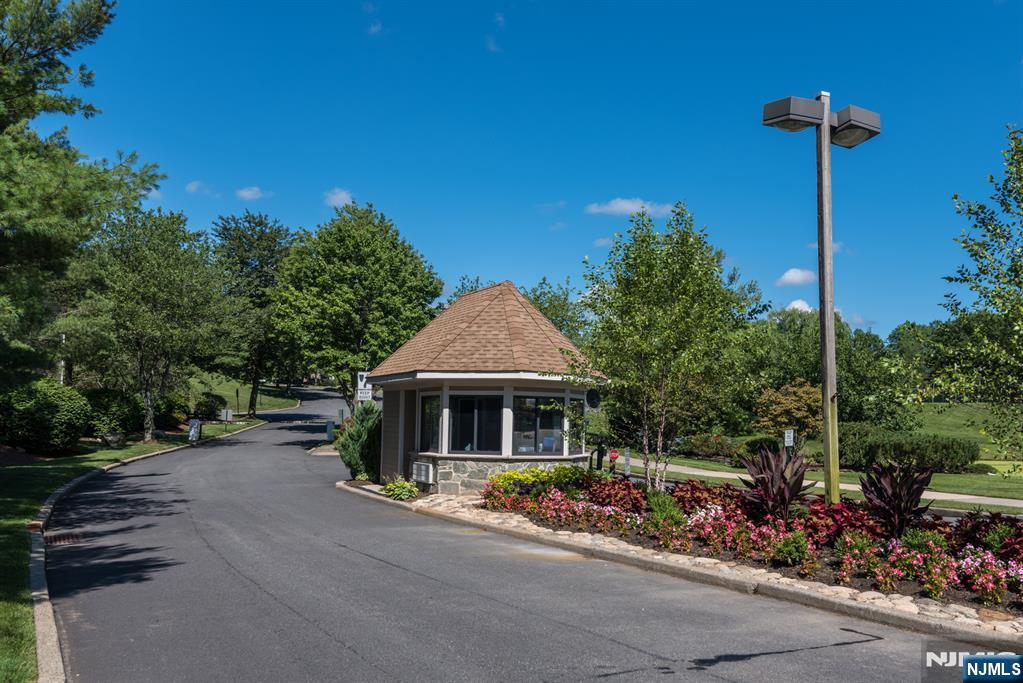 41 Litchult Lane Mahwah, NJ 07430 - Photo 38 of 50 a front view of a house with garden