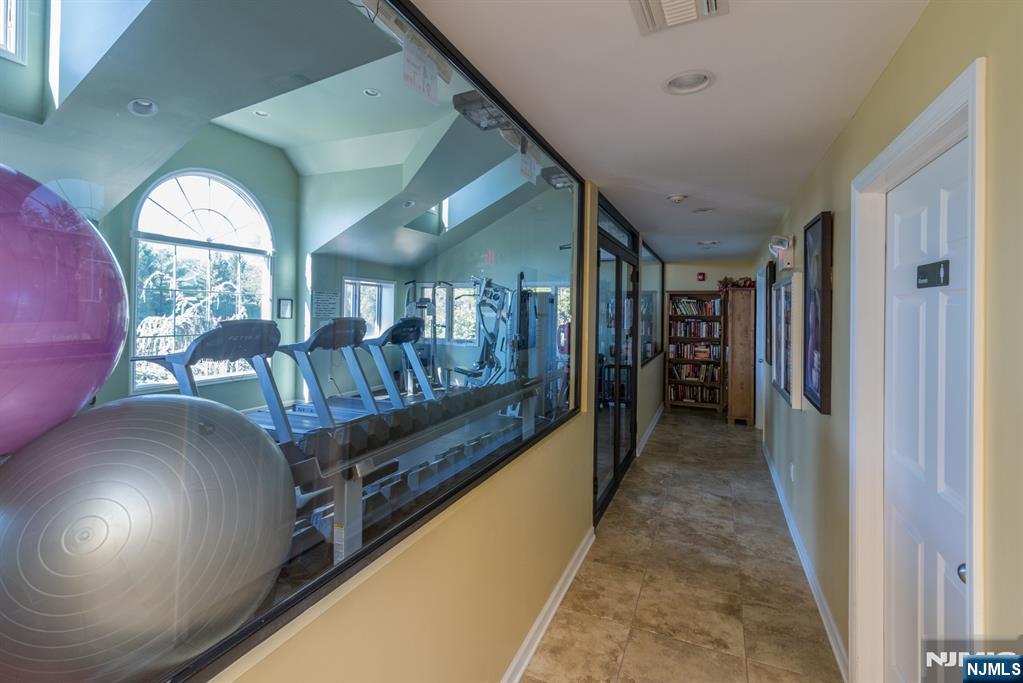 41 Litchult Lane Mahwah, NJ 07430 - Photo 42 of 50 a view of a hallway with furniture