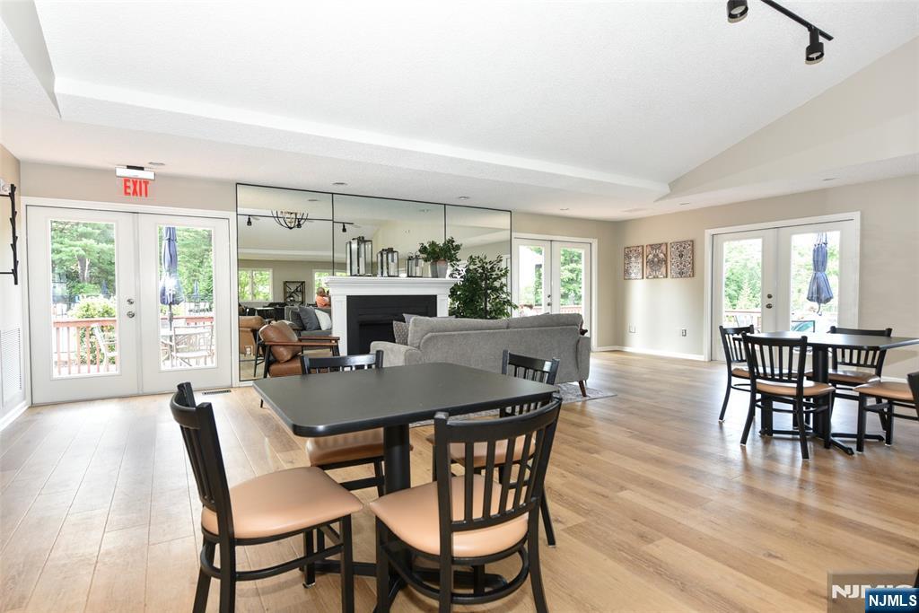 41 Litchult Lane Mahwah, NJ 07430 - Photo 43 of 50 a view of a dining room with furniture window and wooden floor