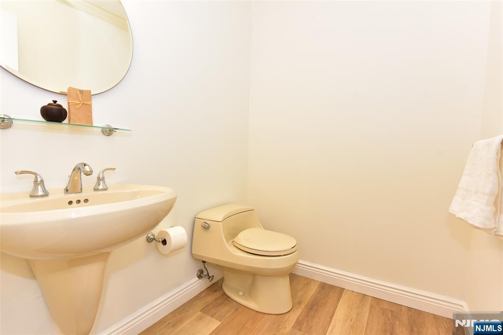 41 Litchult Lane Mahwah, NJ 07430 - Photo 6 of 50 a bathroom with a sink and a mirror