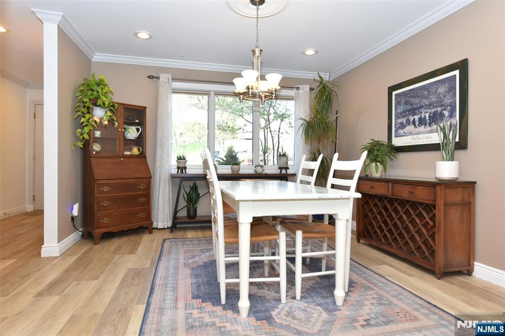 41 Litchult Lane Mahwah, NJ 07430 - Photo 9 of 50 a view of a dining room with furniture window and wooden floor