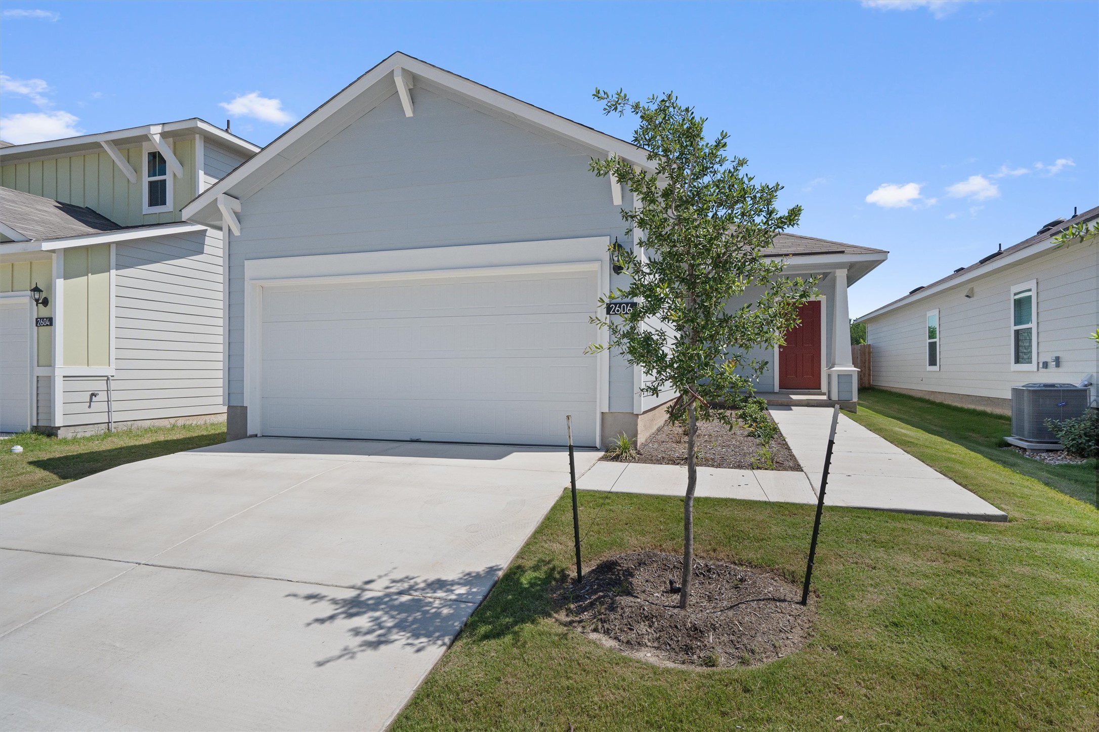 2606 Totley Road Manor, TX 78653 - Photo 25 of 28 a house view with a garden space