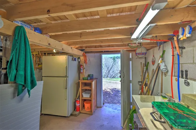 a front view of a house with a yard and fountain