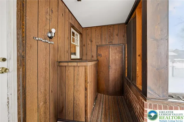 a view of a door and wooden door