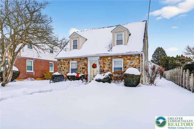 a view of a house with large space in front of it
