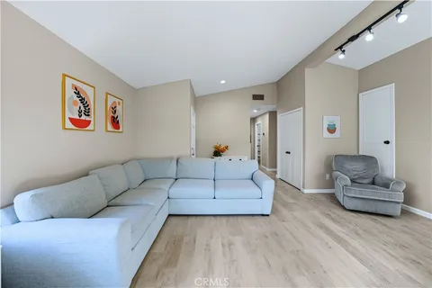a living room with furniture and a couch