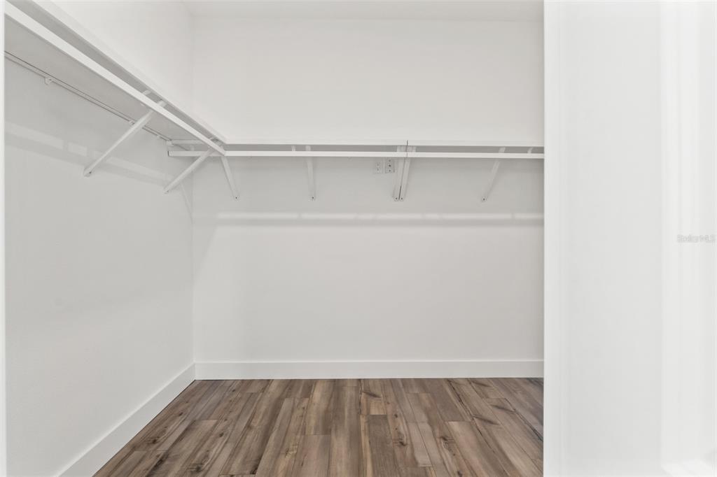 15171 Pomp Parkway Weeki Wachee, FL 34614 - Photo 35 of 50 a view of an empty walk in closet