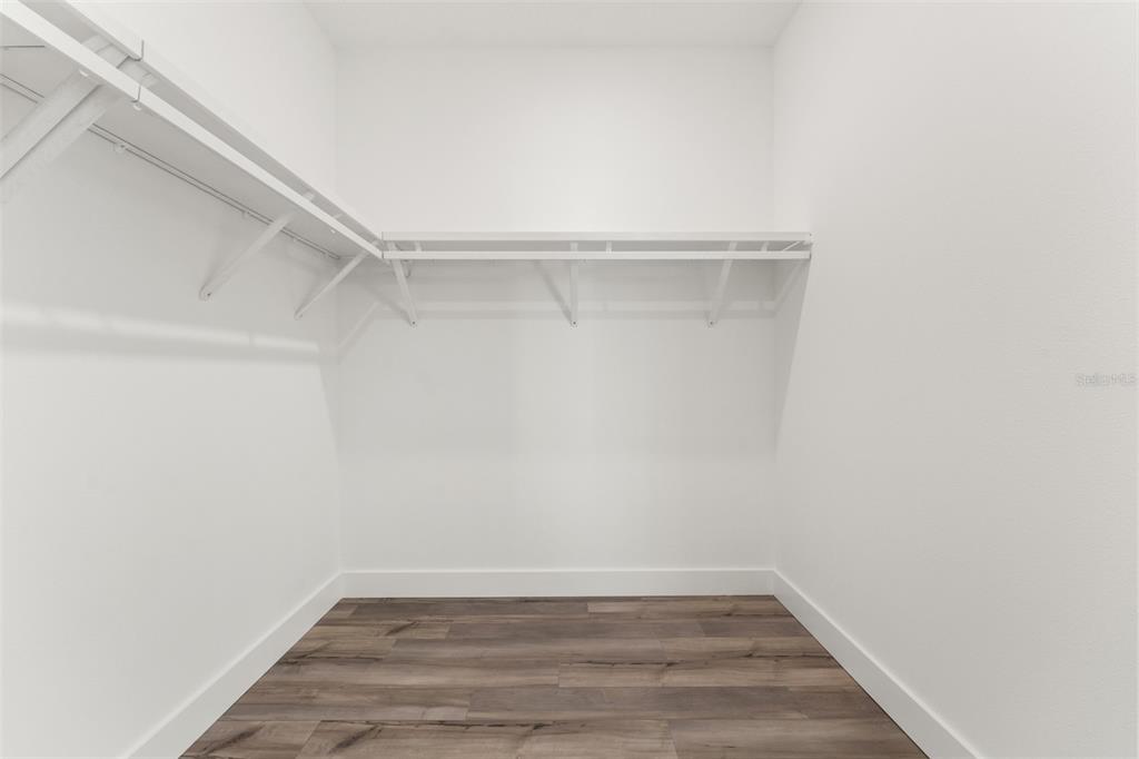 15171 Pomp Parkway Weeki Wachee, FL 34614 - Photo 36 of 50 a view of a room with wooden floor