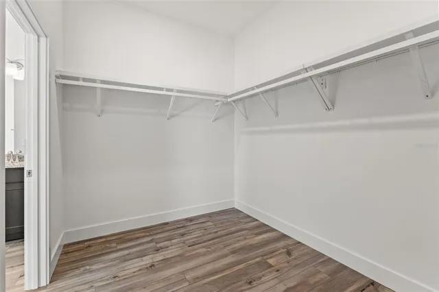 a view of an empty walk in closet