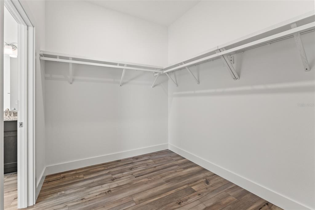 15171 Pomp Parkway Weeki Wachee, FL 34614 - Photo 37 of 50 a view of an empty walk in closet