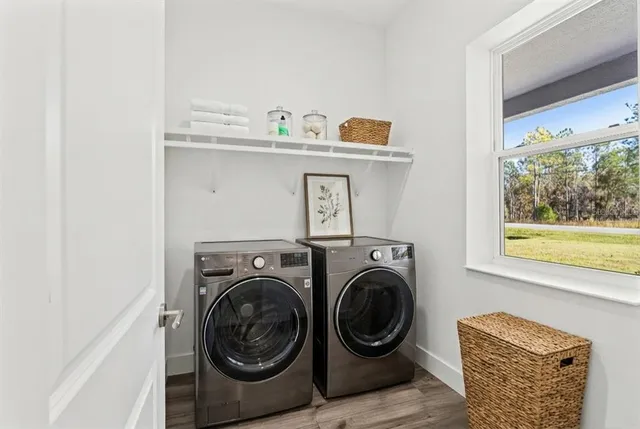 a utility room with dryer and washer