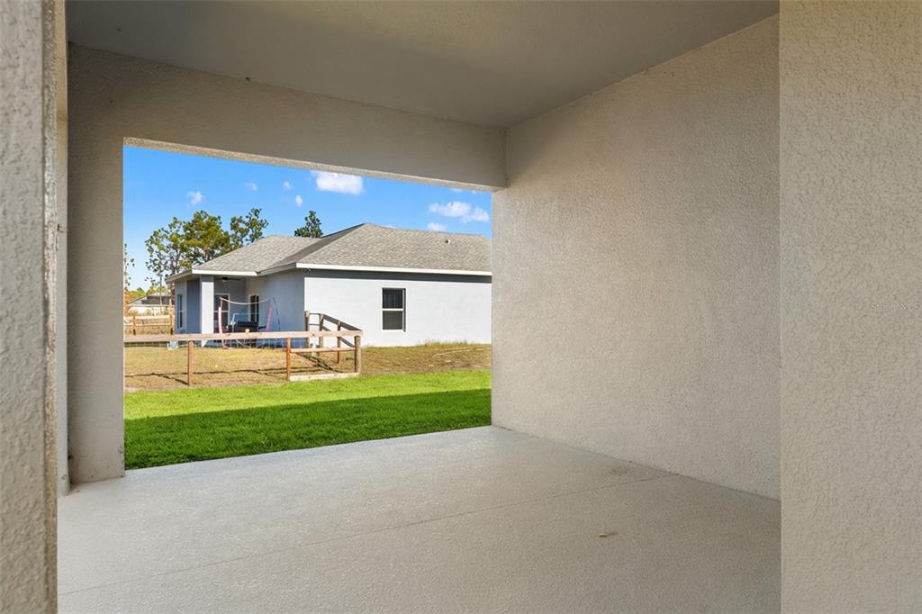 15171 Pomp Parkway Weeki Wachee, FL 34614 - Photo 46 of 50 a house view with a garden space