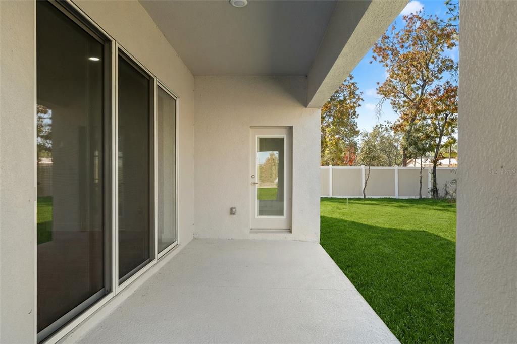 15171 Pomp Parkway Weeki Wachee, FL 34614 - Photo 47 of 50 a view of a house with a backyard