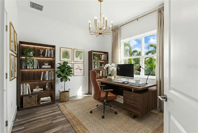 a view of a workspace with furniture