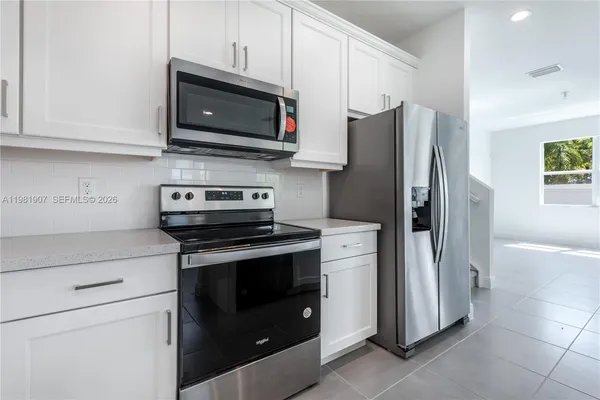 an empty room with windows