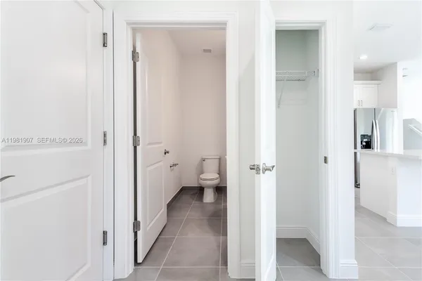 a bathroom with a granite countertop window