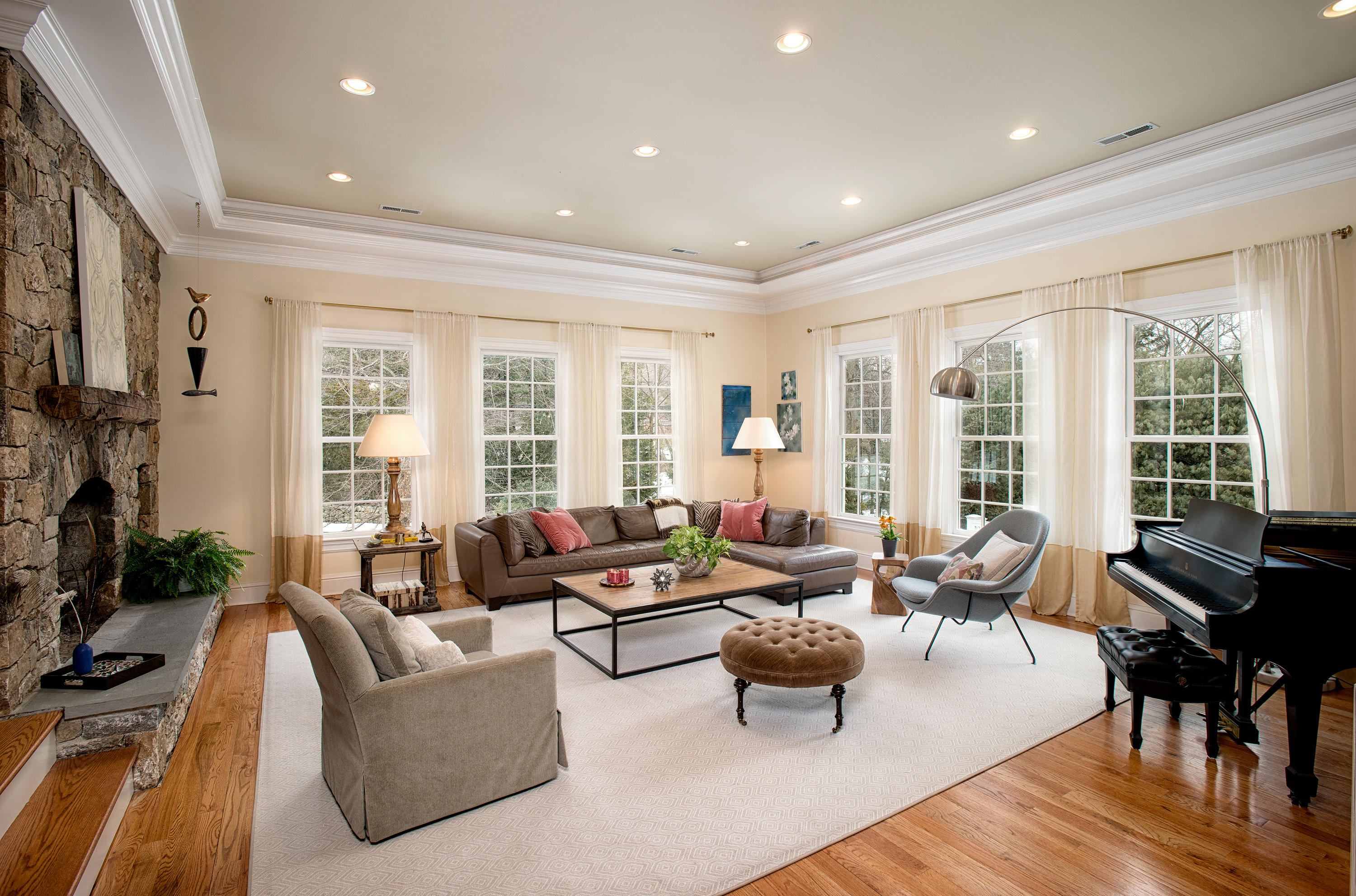 276 White Oak Shade Road New Canaan, CT 06840 - Photo 14 of 36 a living room with furniture and floor to ceiling windows