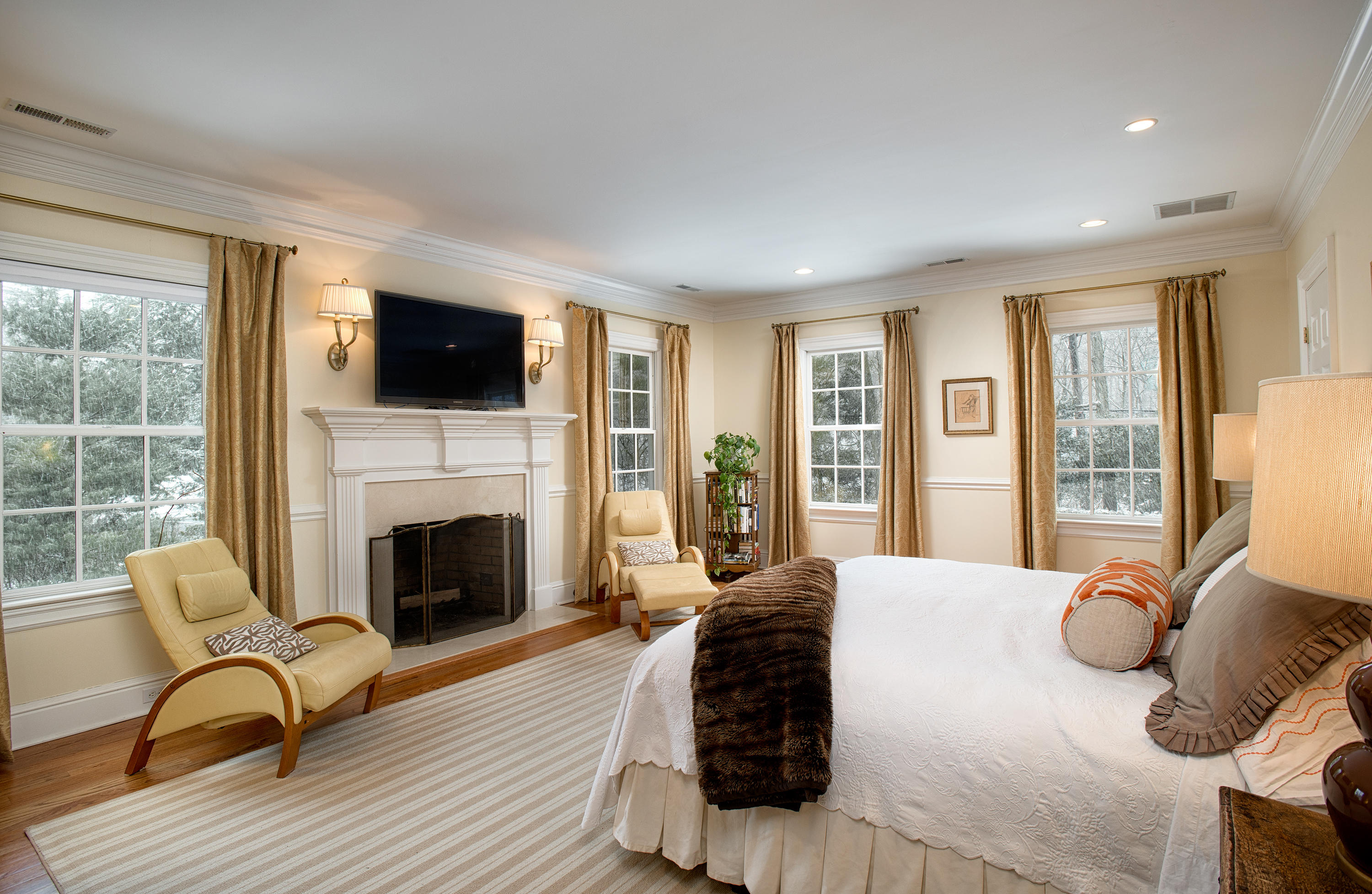 276 White Oak Shade Road New Canaan, CT 06840 - Photo 18 of 36 a living room with furniture fireplace and flat screen tv