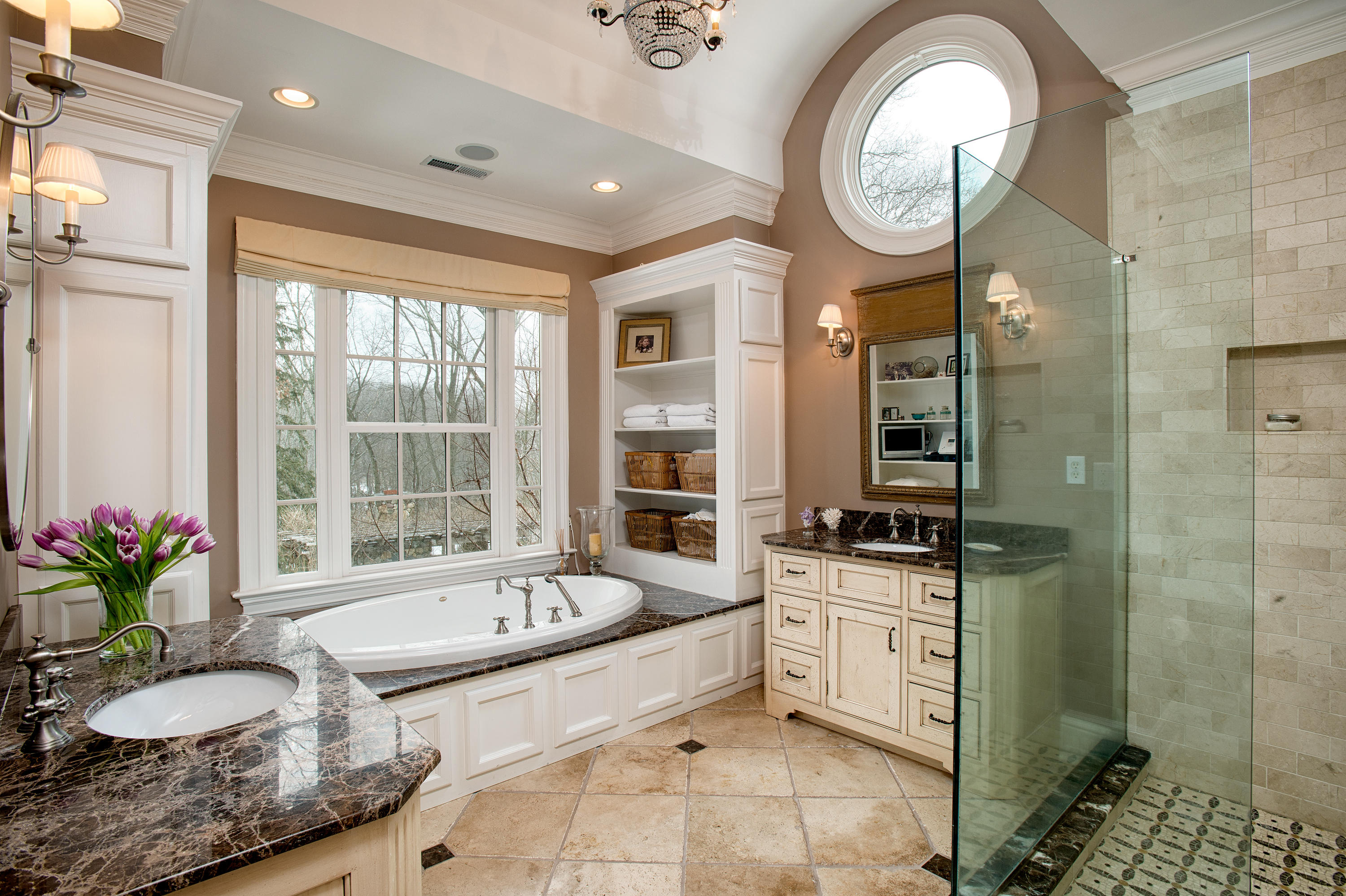 276 White Oak Shade Road New Canaan, CT 06840 - Photo 19 of 36 a spacious bathroom with a granite countertop tub a mirror and a shower