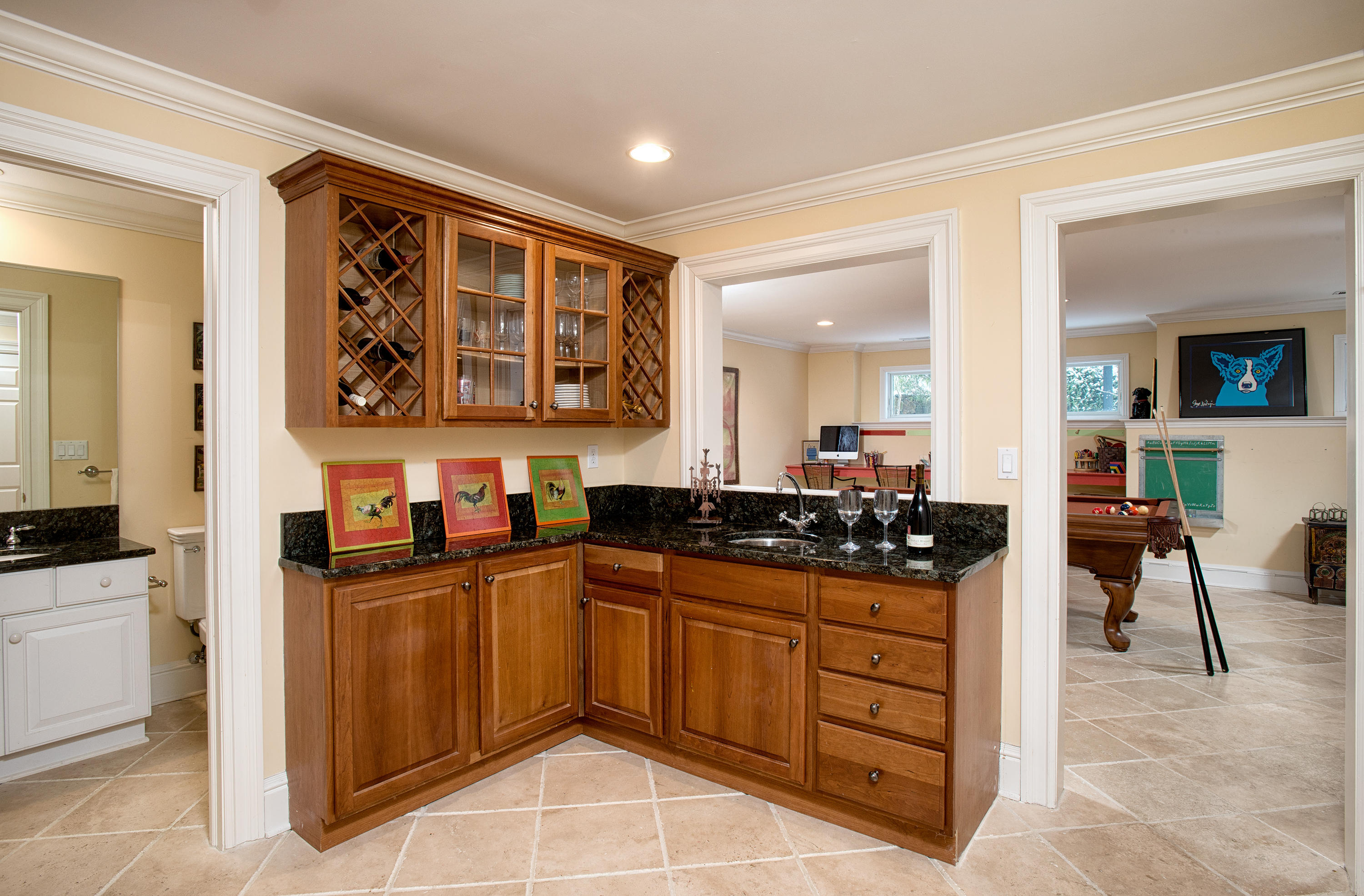 276 White Oak Shade Road New Canaan, CT 06840 - Photo 22 of 36 a kitchen with stainless steel appliances granite countertop a stove a sink and a refrigerator