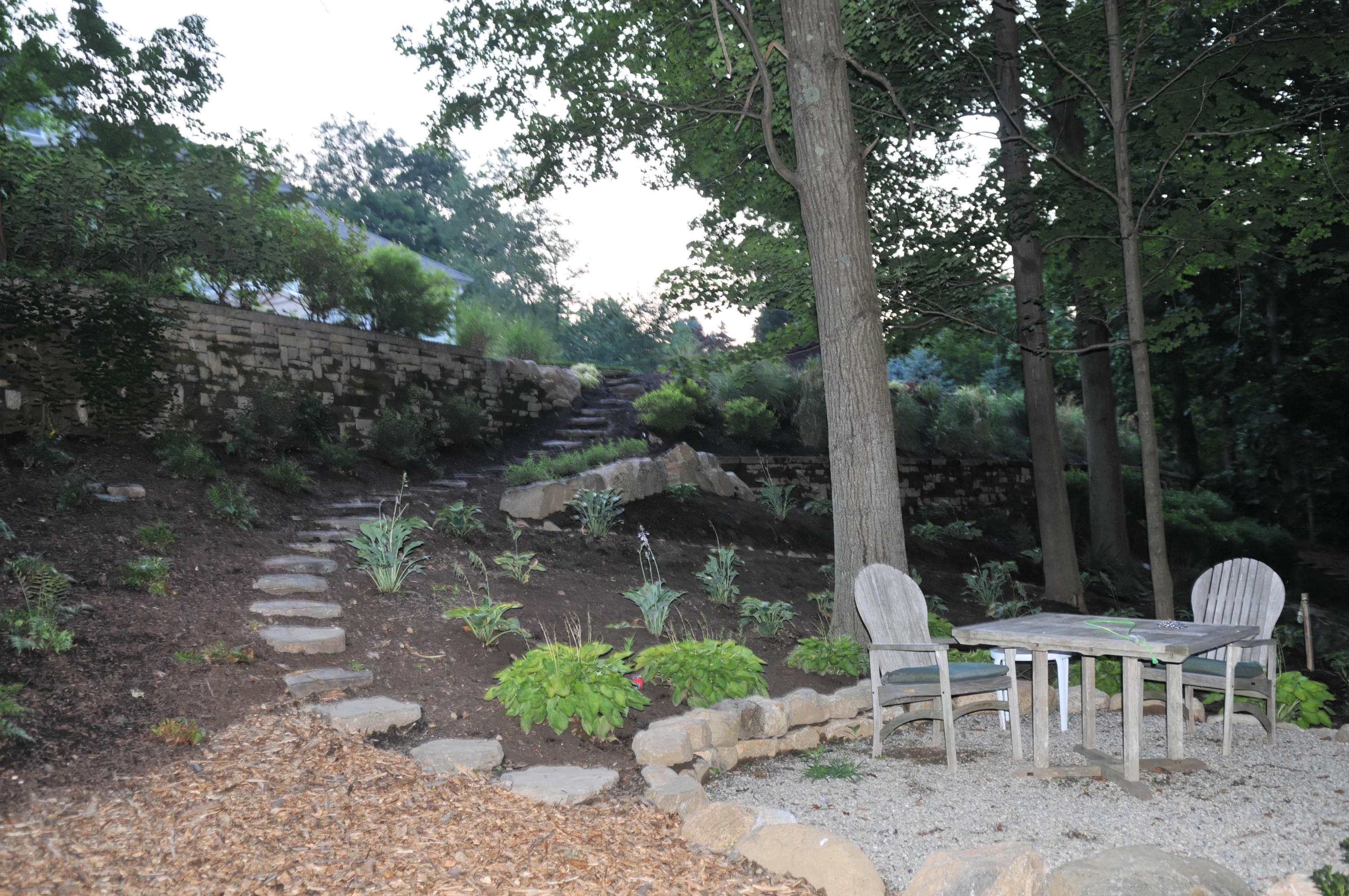 276 White Oak Shade Road New Canaan, CT 06840 - Photo 33 of 36 a view of a tables and chairs in patio