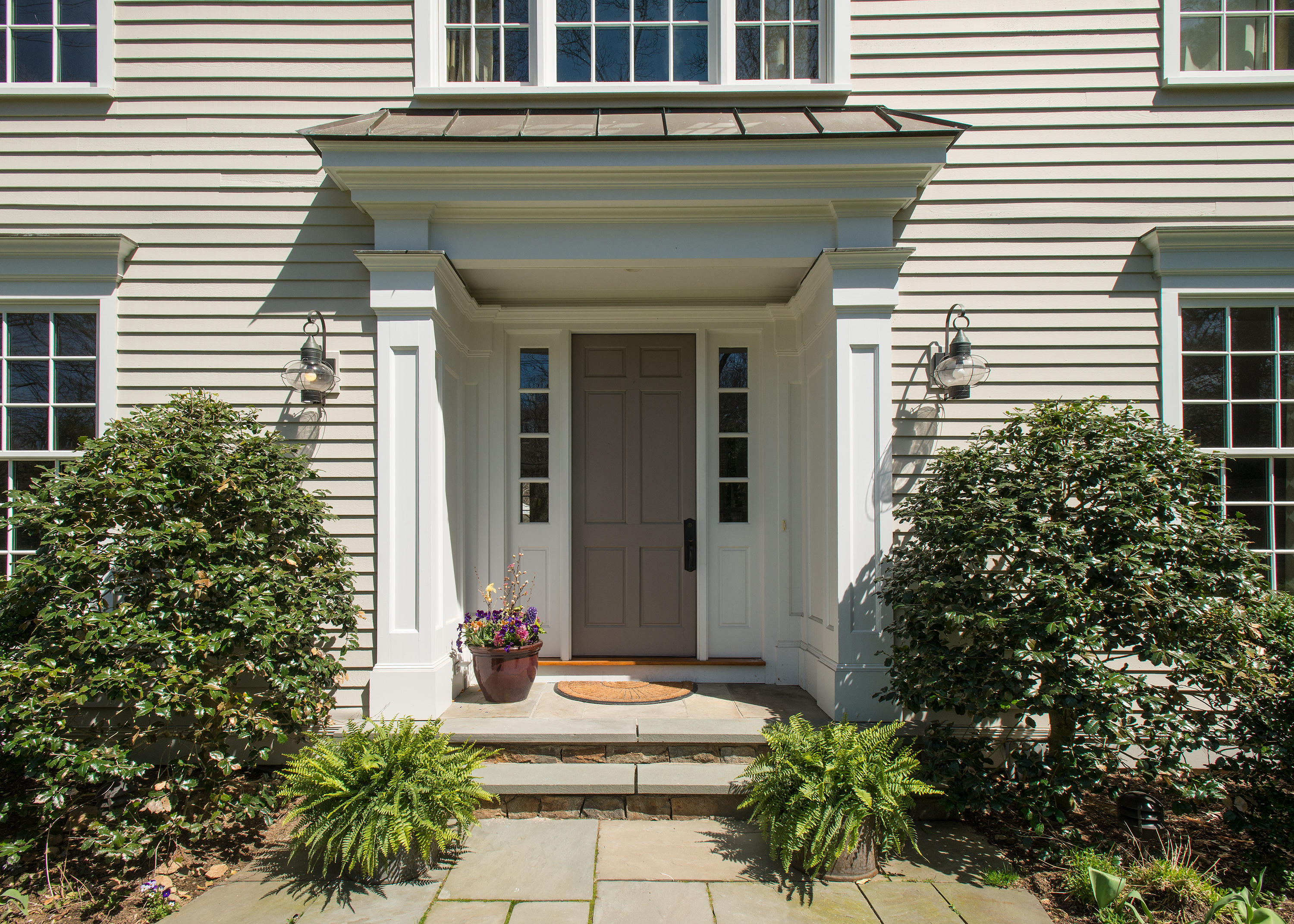 276 White Oak Shade Road New Canaan, CT 06840 - Photo 4 of 36 a view of a house with potted plants
