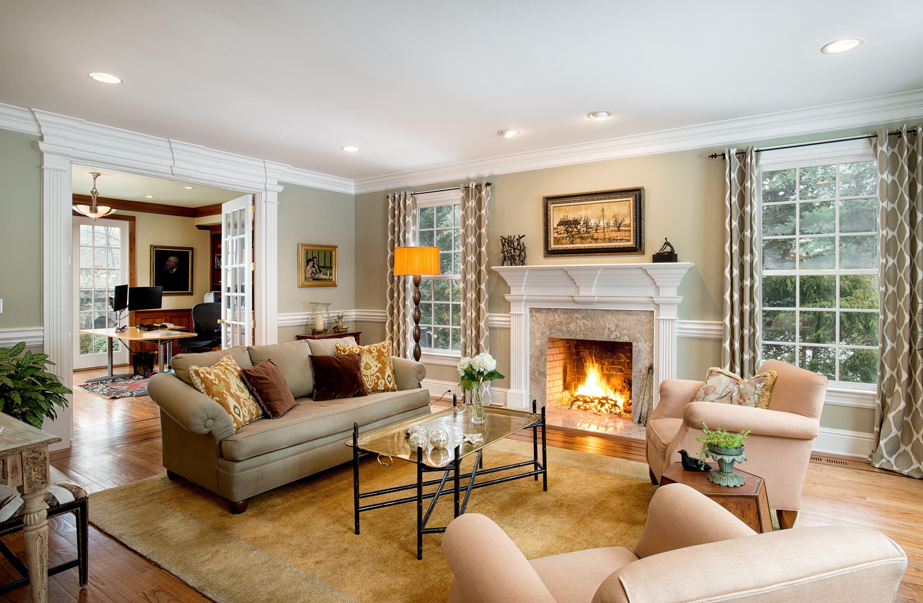 276 White Oak Shade Road New Canaan, CT 06840 - Photo 6 of 36 a living room with furniture and a fireplace
