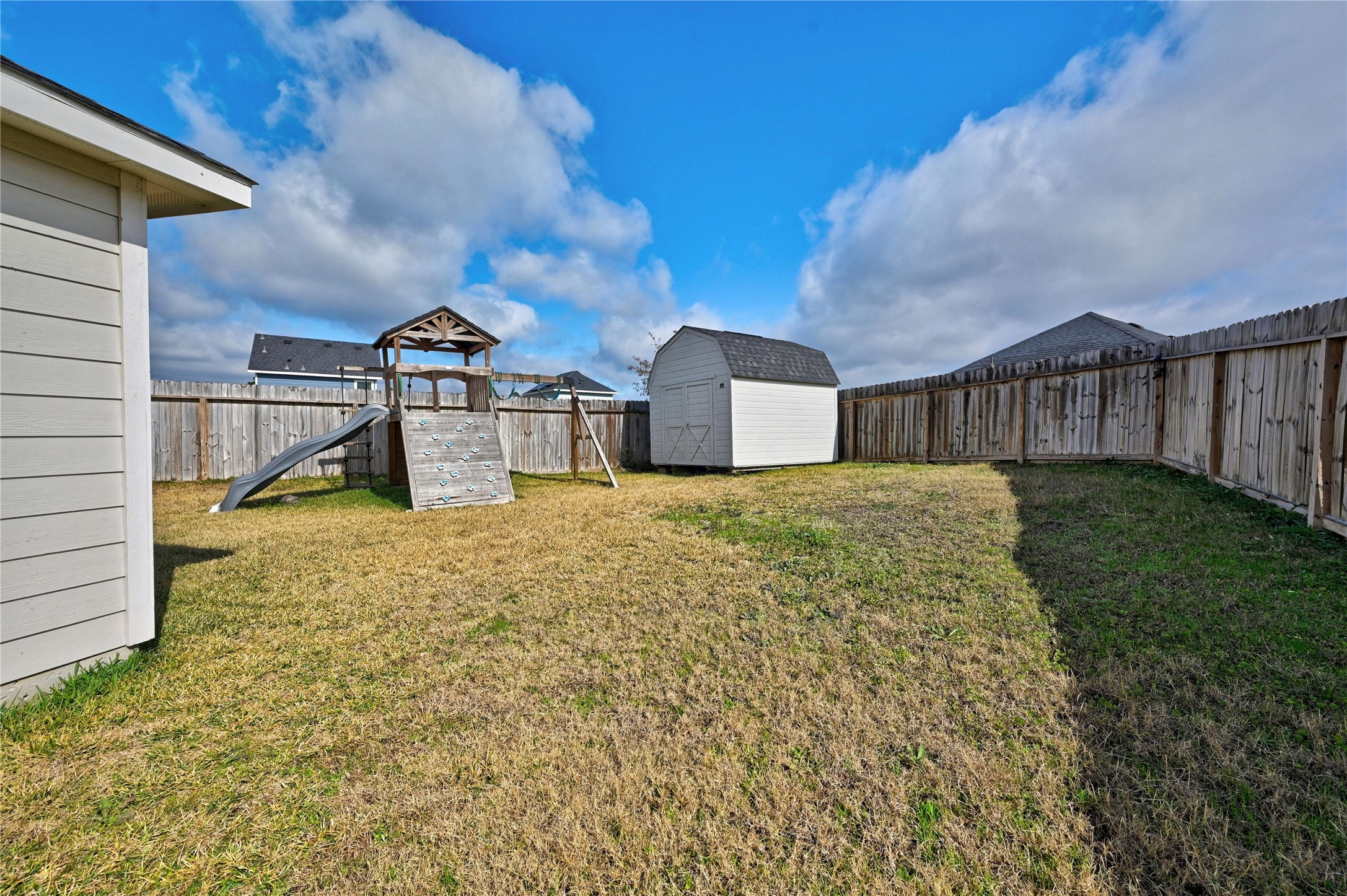 16623 Colleen Place Conroe, TX 77306 - Photo 29 of 44 Storage building and play set.
