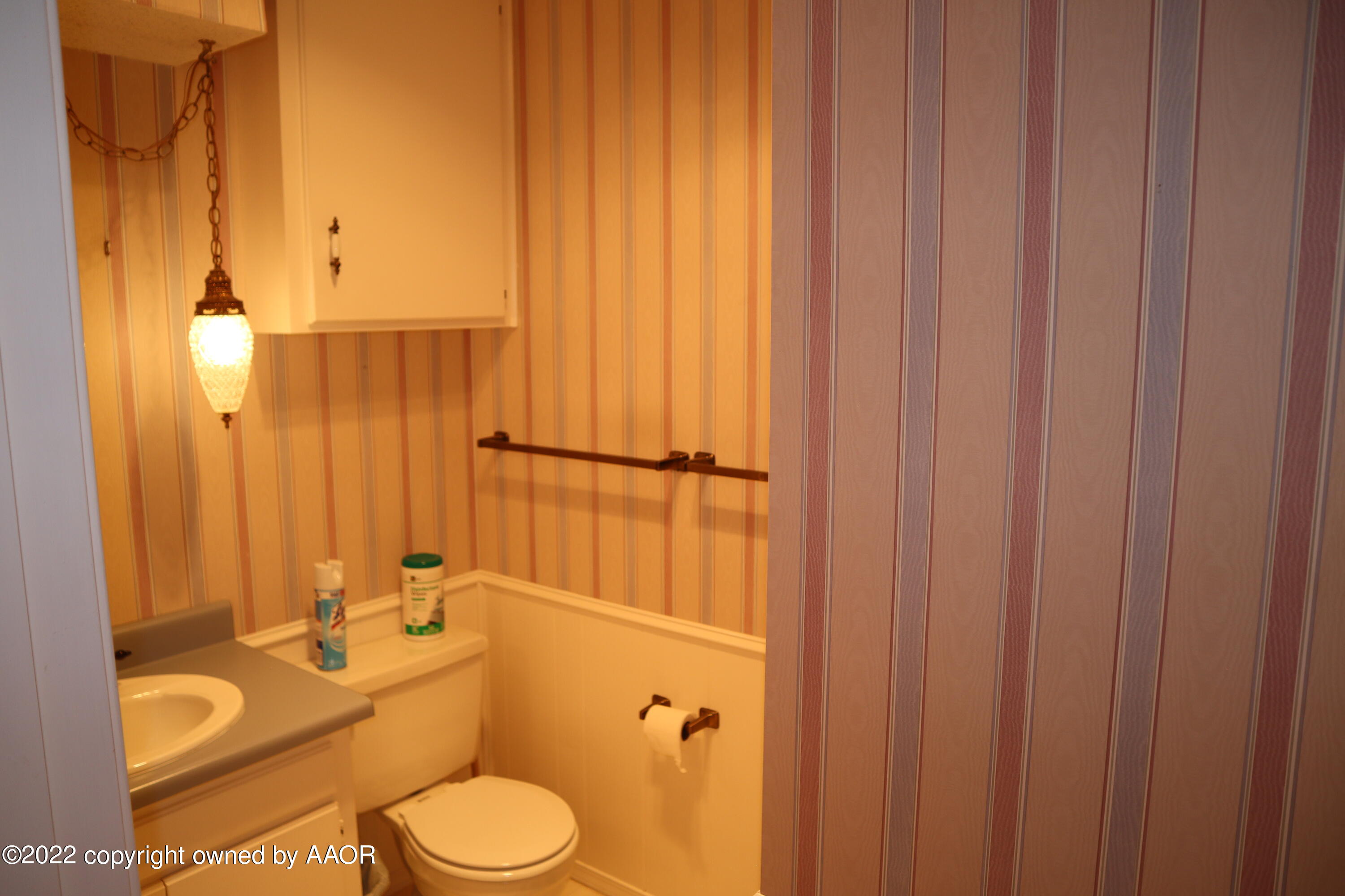 8201 Goodnight Trail Amarillo, TX 79110 - Photo 19 of 23 a bathroom with a granite countertop sink toilet and shower