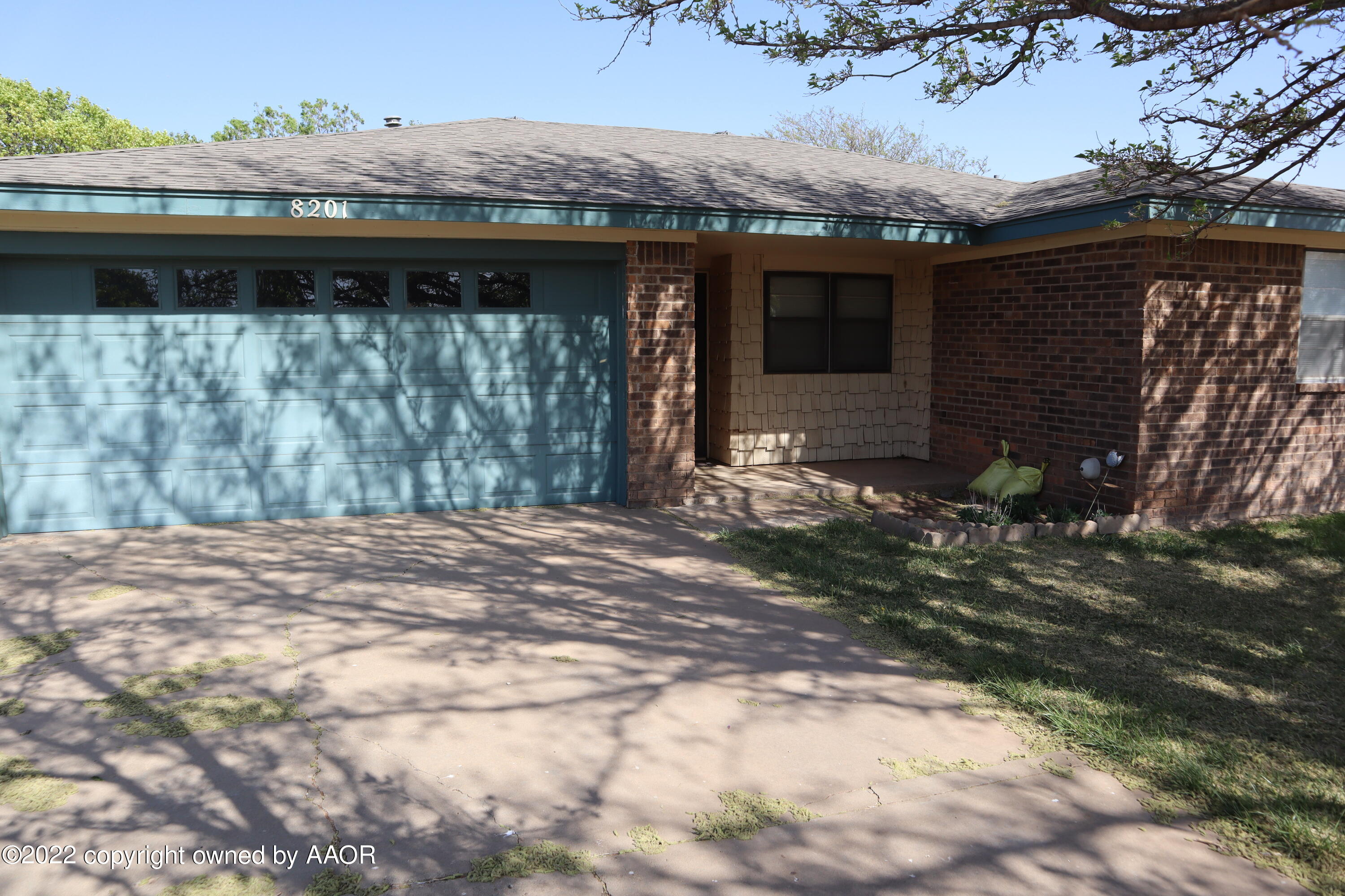 8201 Goodnight Trail Amarillo, TX 79110 - Photo 3 of 23 a front view of a house