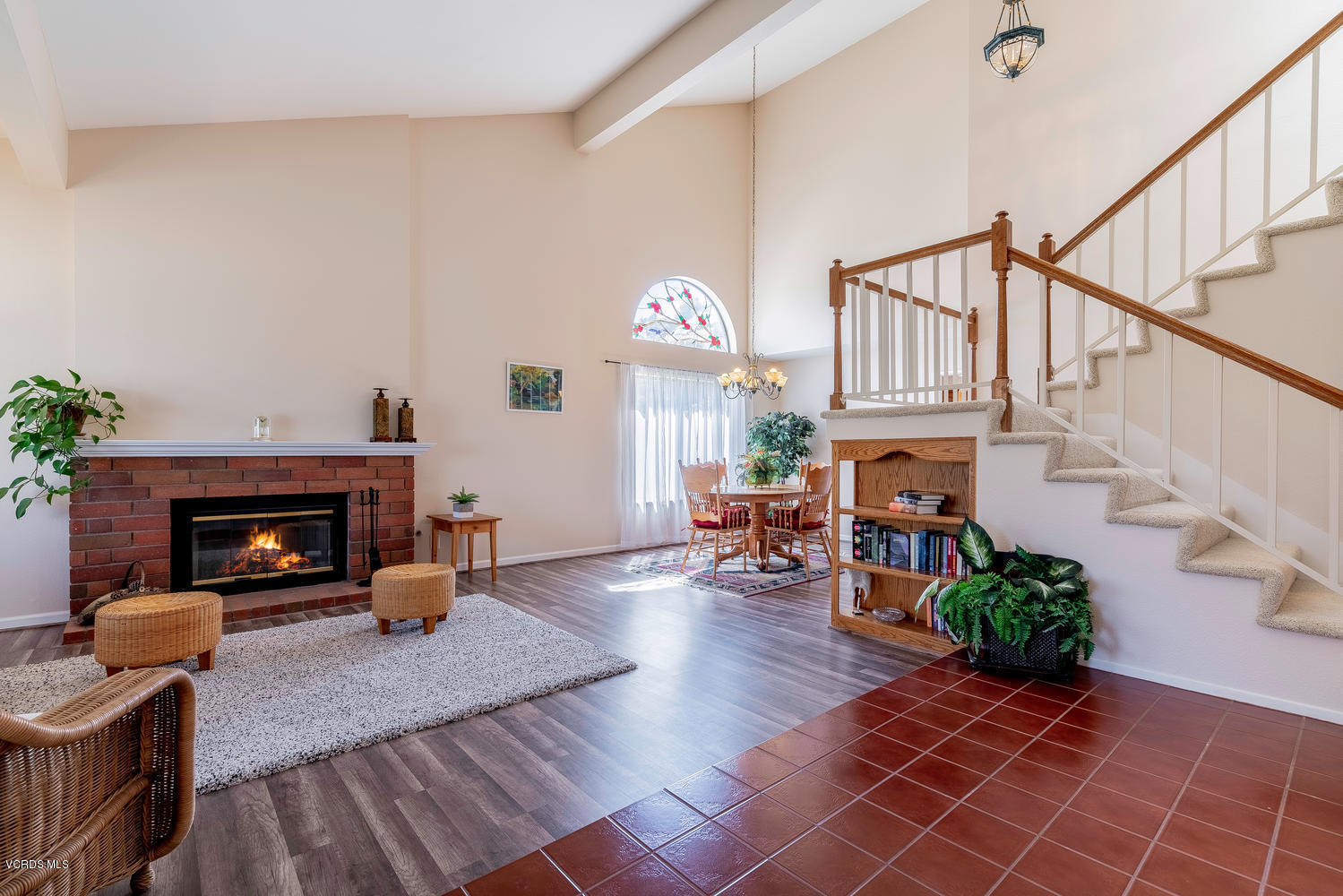 13762 Gunsmoke Road Moorpark, CA 93021 - Photo 2 of 36 a living room with furniture a fireplace and potted plants