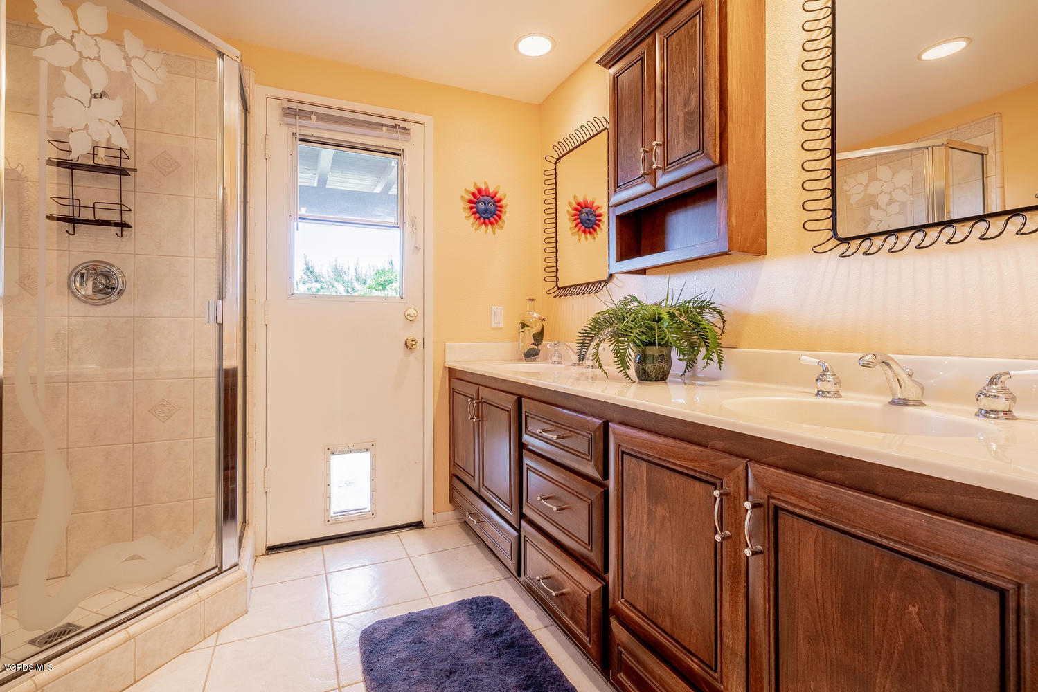 13762 Gunsmoke Road Moorpark, CA 93021 - Photo 19 of 36 a bathroom with a sink and a mirror
