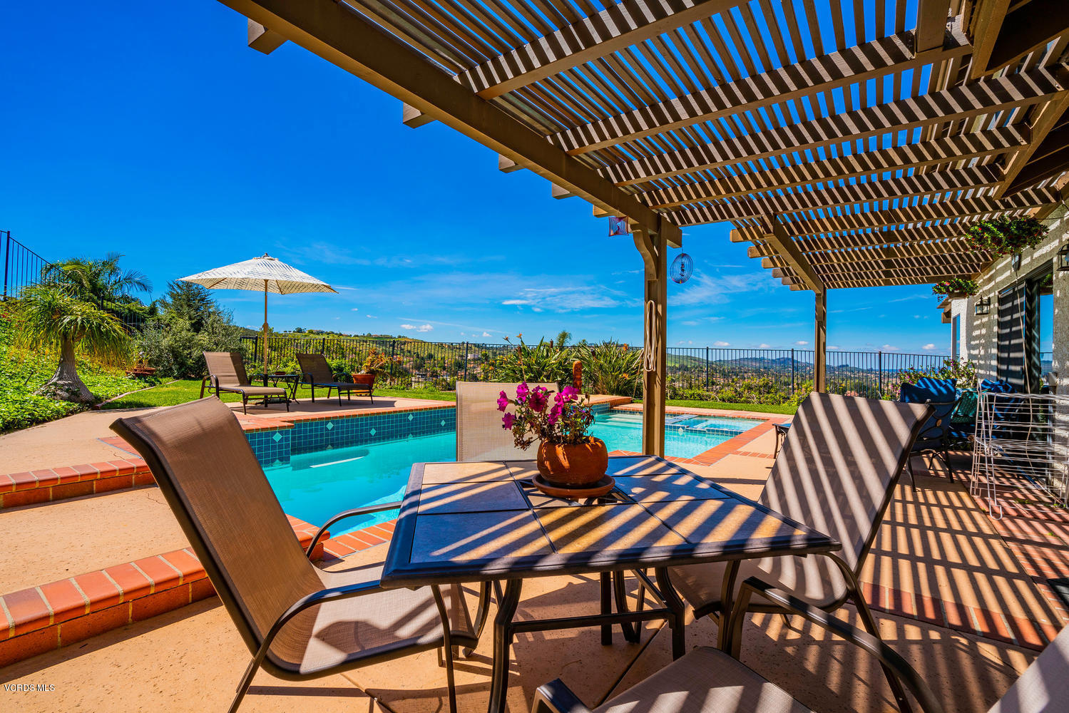 13762 Gunsmoke Road Moorpark, CA 93021 - Photo 4 of 36 a view of a chairs and table in the patio