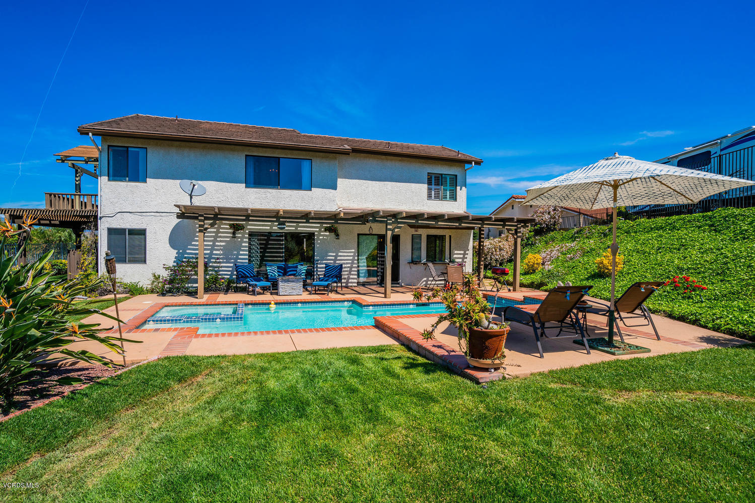 13762 Gunsmoke Road Moorpark, CA 93021 - Photo 34 of 36 a view of a house with a yard patio and fire pit