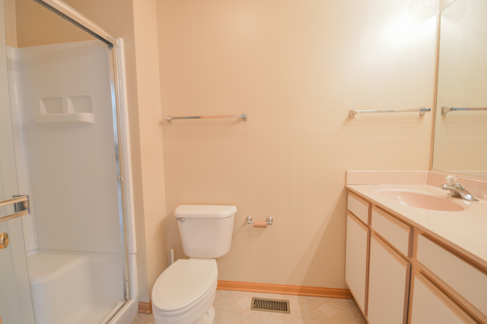 776 River Walk Drive Wheeling, IL 60090 - Photo 19 of 25 a bathroom with a sink a toilet and shower