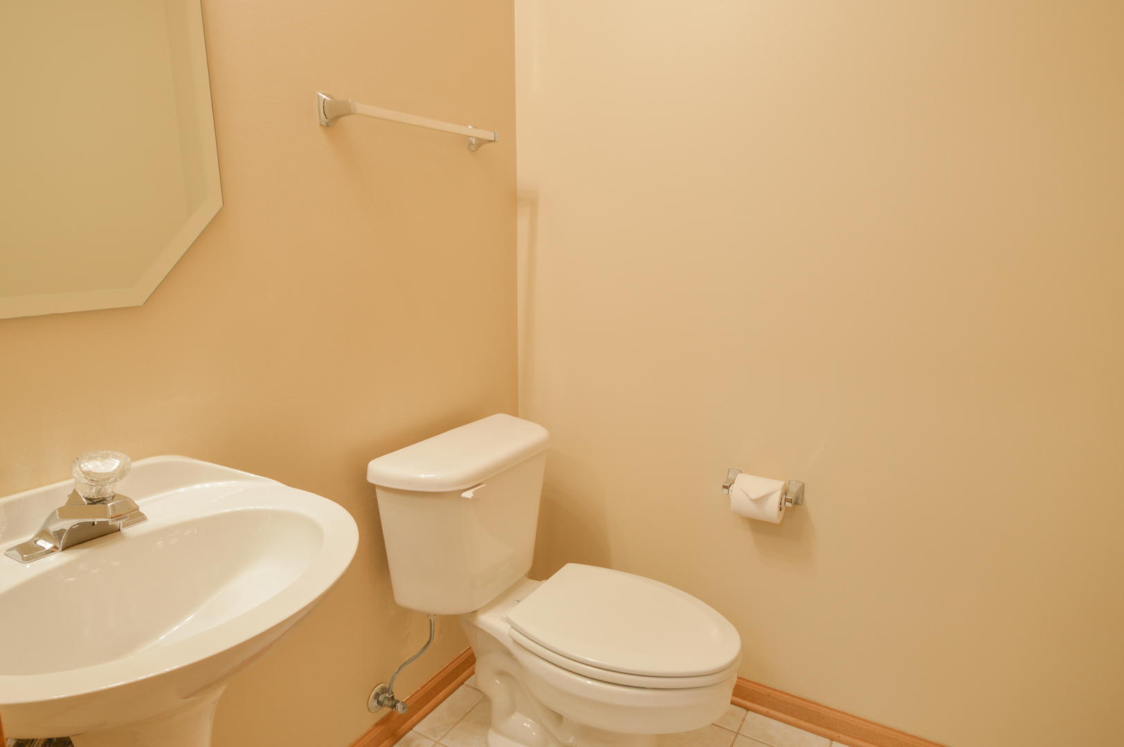 776 River Walk Drive Wheeling, IL 60090 - Photo 25 of 25 a white toilet sitting next to a bathroom sink