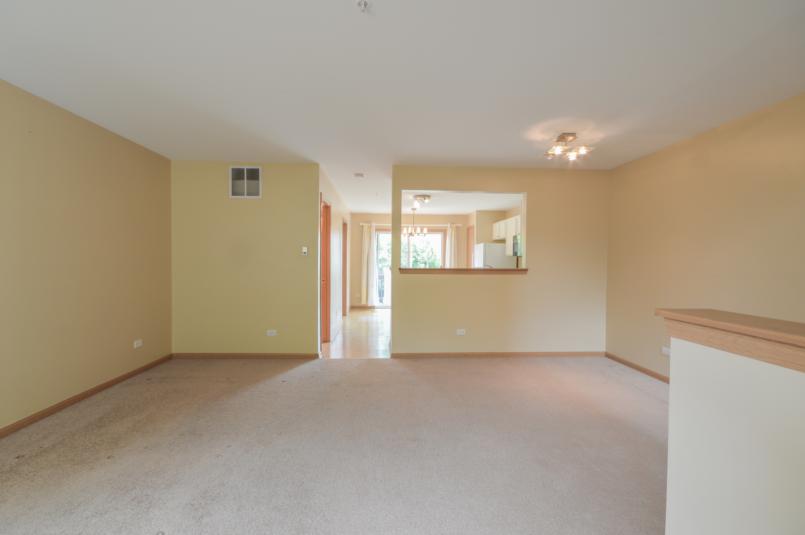 776 River Walk Drive Wheeling, IL 60090 - Photo 4 of 25 a view of an empty room with a window