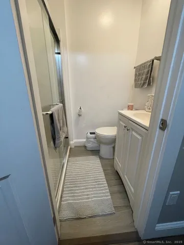 a bathroom with a sink and toilet