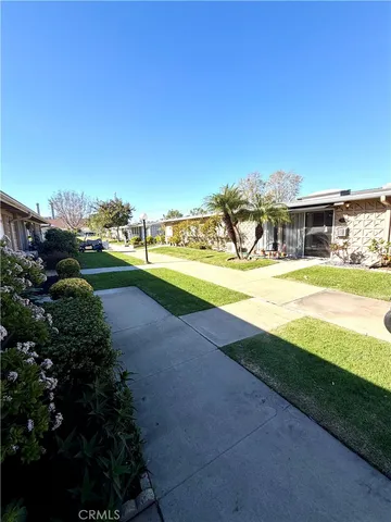 a view of a yard with an outdoor space