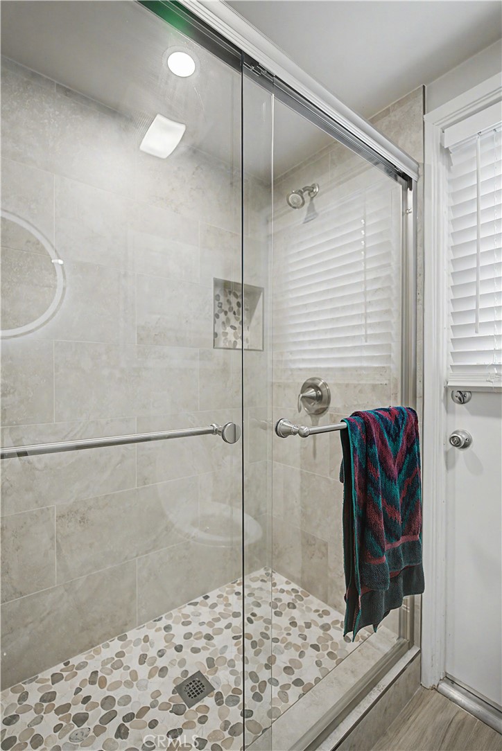 22671 Town Crier Road Calabasas, CA 91302 - Photo 18 of 35 a bathroom with a shower