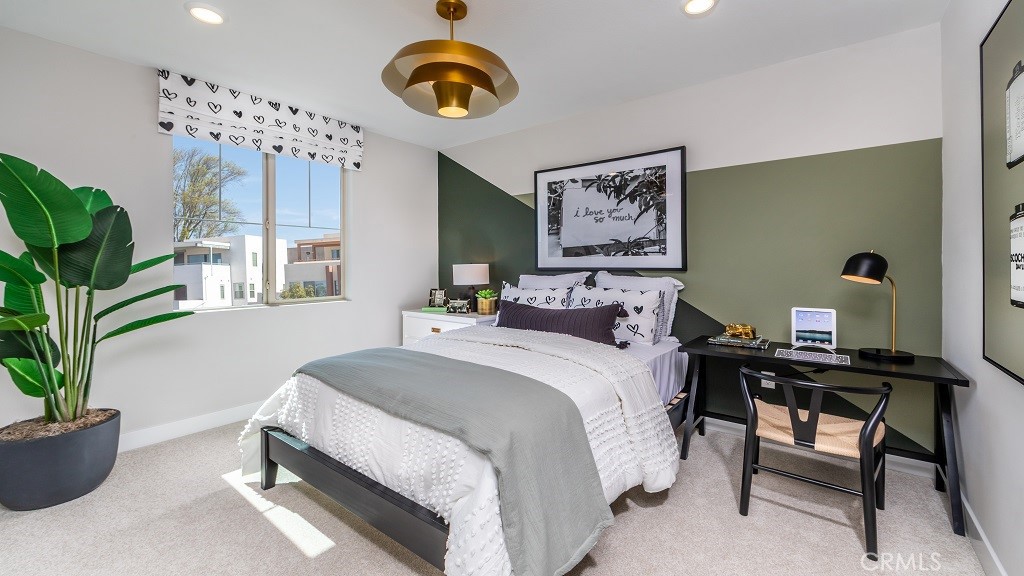 91 Interval Irvine, CA 92618 - Photo 9 of 14 a bedroom with a bed and a chandelier