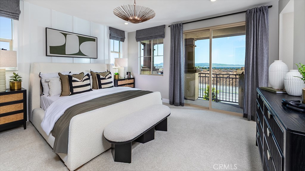 91 Interval Irvine, CA 92618 - Photo 4 of 14 a bedroom with a bed a dresser next to a window