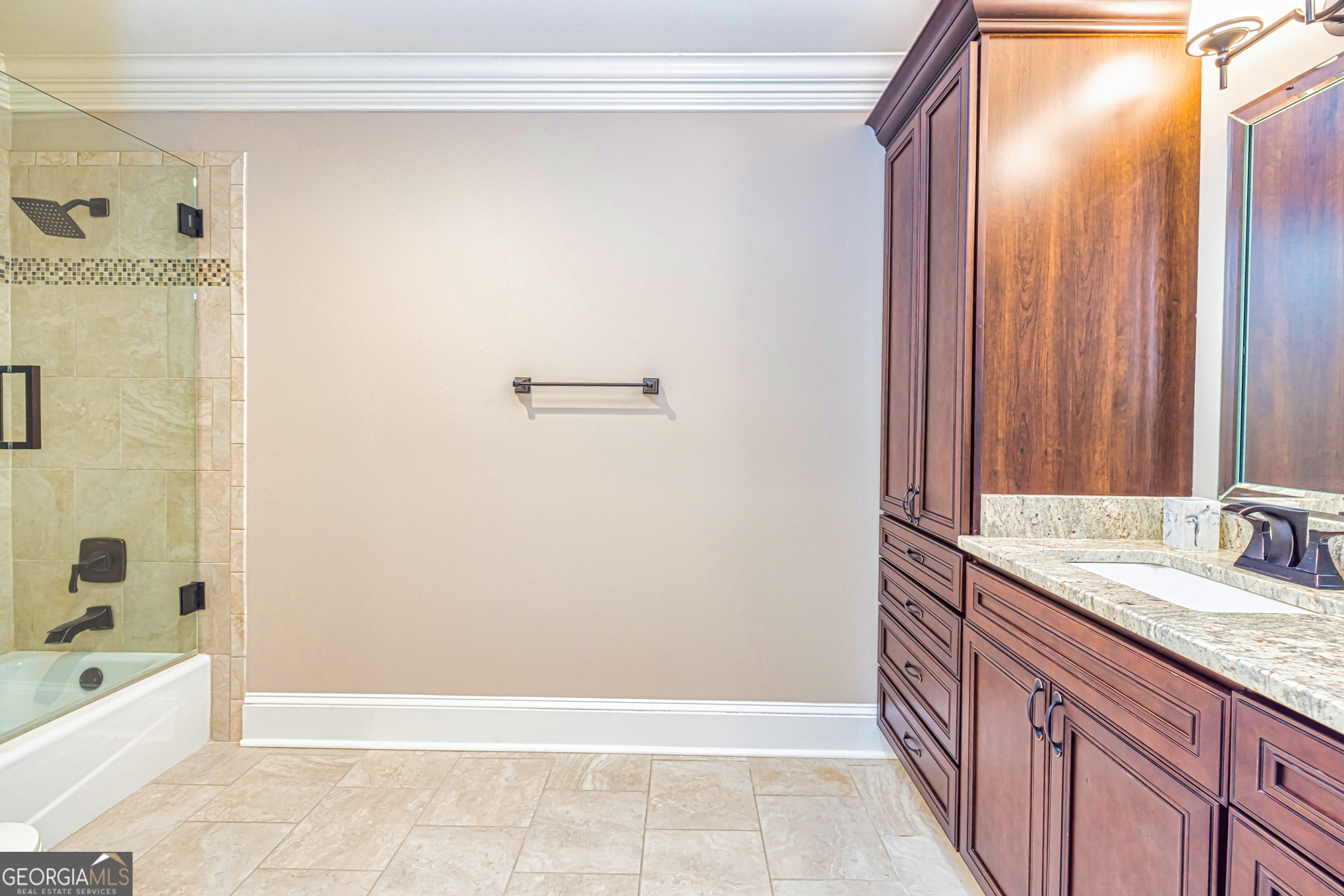 131 Lincoln Road Tyrone, GA 30290 - Photo 54 of 78 a spacious bathroom with a granite countertop sink and a bathtub