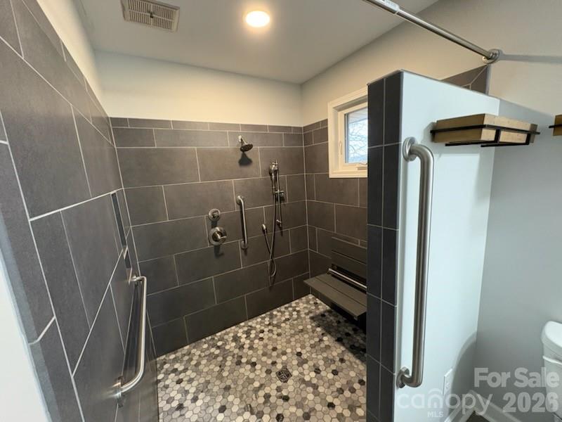 2610 Taylor Road Shelby, NC 28152 - Photo 32 of 47 a bathroom with a shower and a toilet