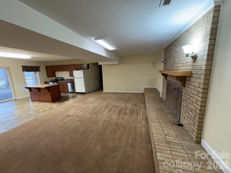 2610 Taylor Road Shelby, NC 28152 - Photo 35 of 47 an empty room with wooden floor and windows
