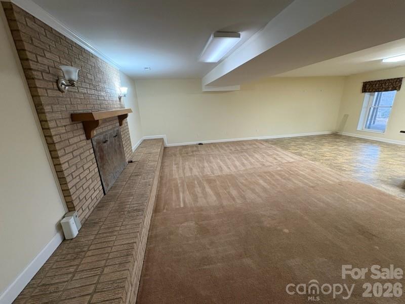 2610 Taylor Road Shelby, NC 28152 - Photo 36 of 47 a view of a hallway with wooden floor and staircase
